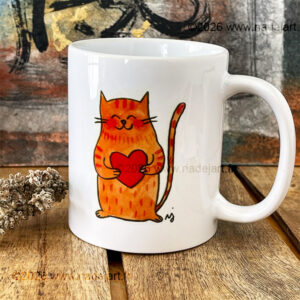 mug avec un chat roux d'un côté et des cœurs de l'autre