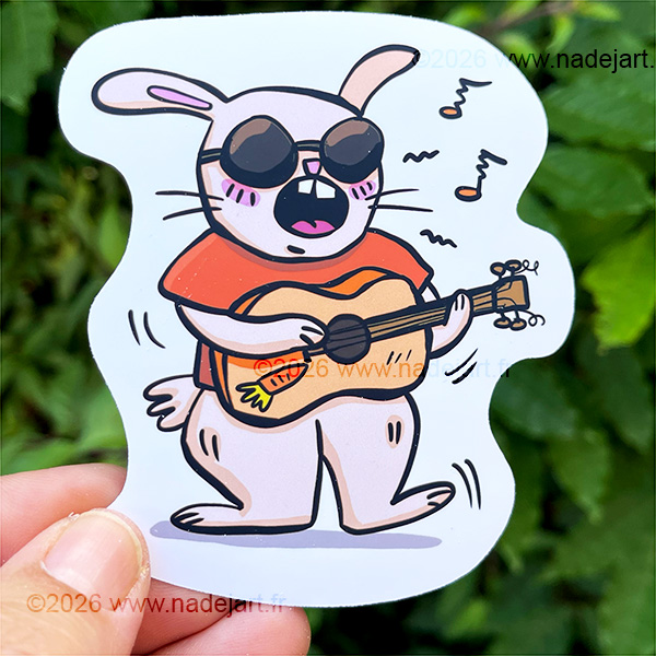 grand sticker en vynil blanc avec un lapin style humour qui joue de la guitare et qui chante ©2026 www.nadejart.fr